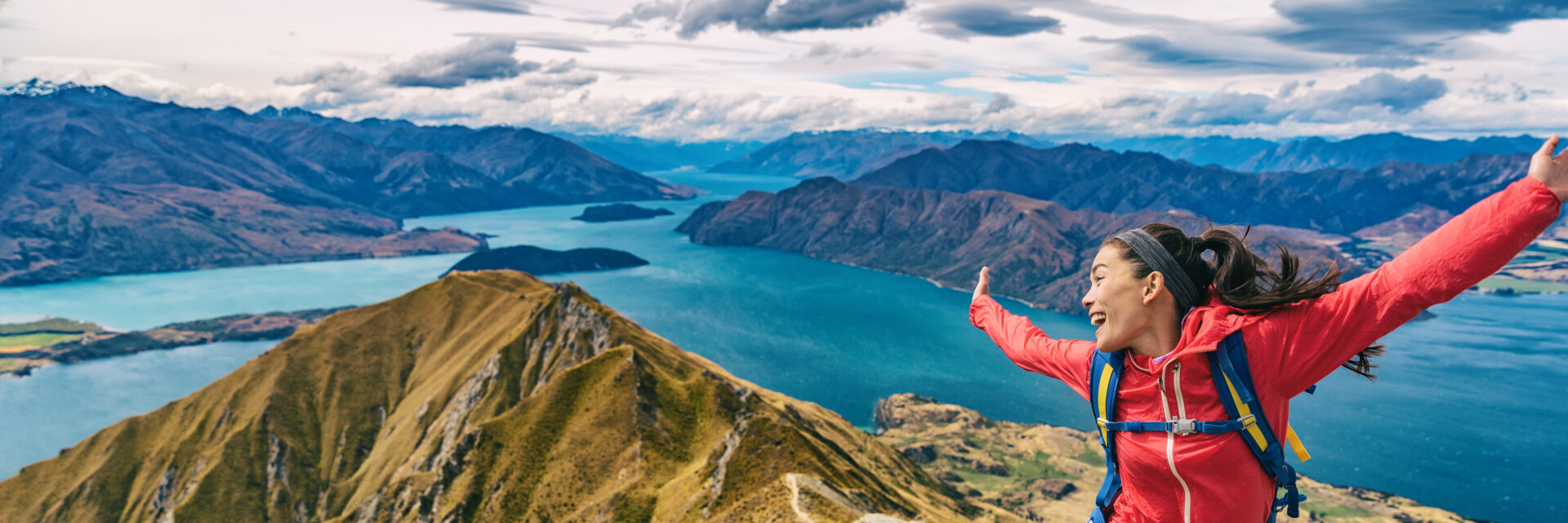 Hiker Jumping Of Joy Funny Woman Hiking In New Zealand